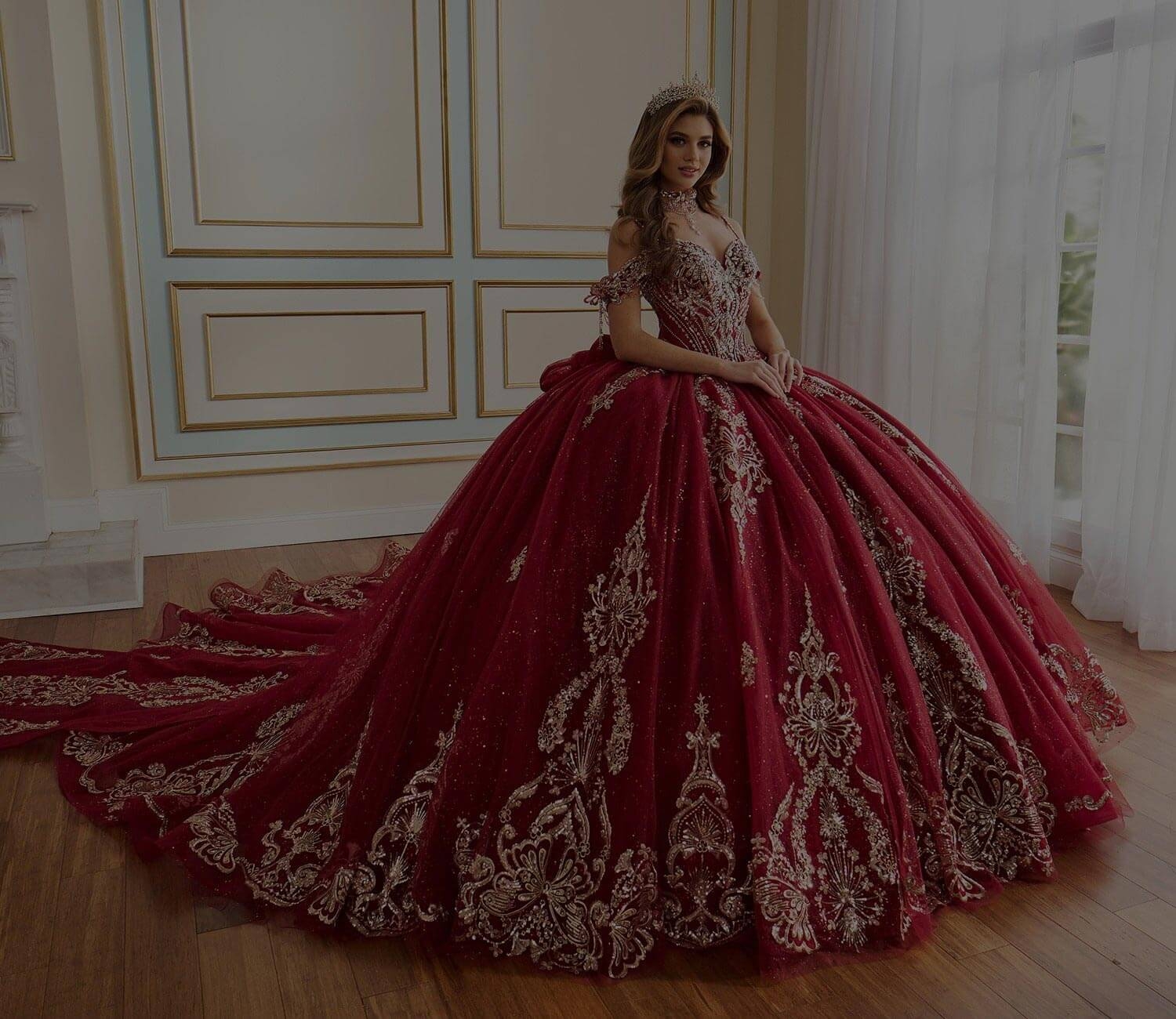 Photo of the model wearing a red gown - Mobile Image